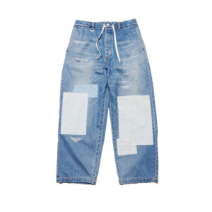 UNIFORM EXPERIMENT: Vaqueros de corte ancho con efecto patchwork