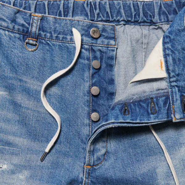 UNIFORM EXPERIMENT Parchworked Wide-Fit Jeans