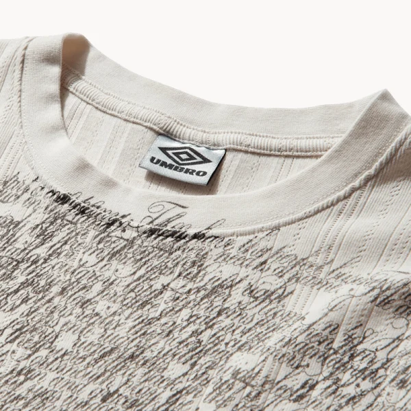 UMBRO Biography Pointelle Baby Tee – White Powder